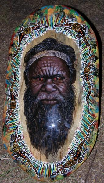 Shield with red-eyed Aboriginal Warrior